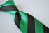 green and black barber striped tie